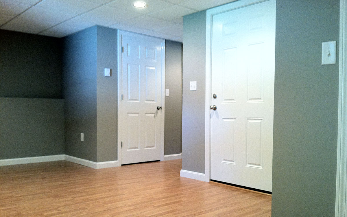 A finished basement we did that uses Pergo flooring and Tegular 2x2 ceiling tiles.