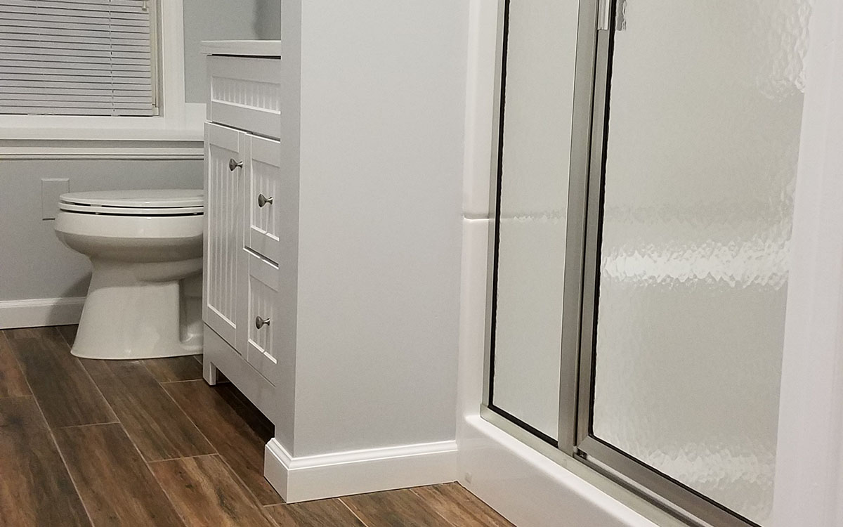 A new bathroom built in a finished basement.