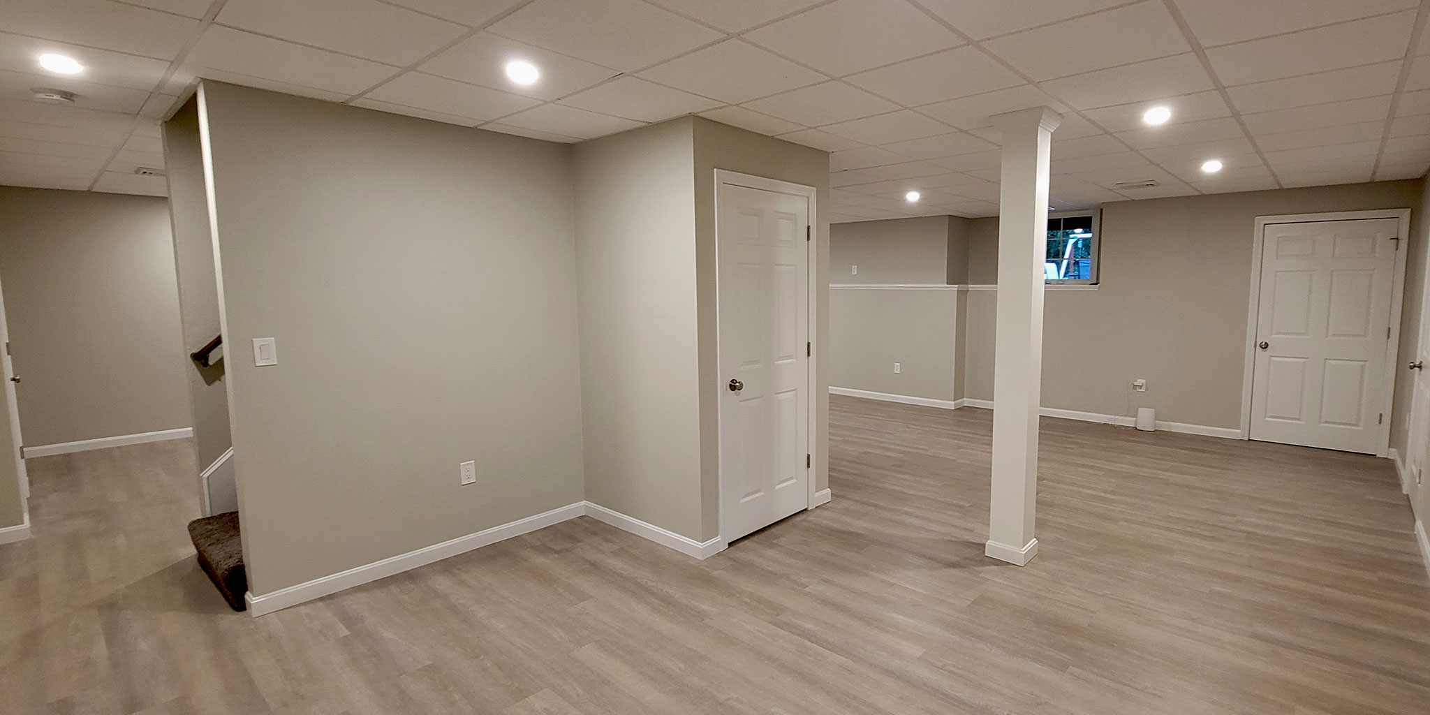 This basement image is taken near the full bathroom and electrical room.